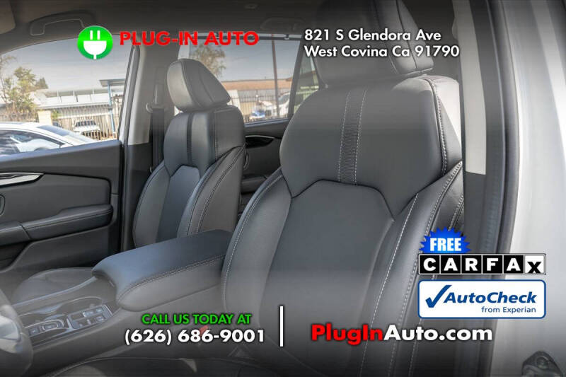 2023 Honda Pilot EX-L w/Rear Captain's Chairs