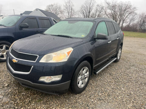 2011 Chevrolet Traverse for sale at HEDGES USED CARS in Carleton MI