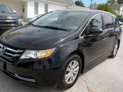 2014 Honda Odyssey for sale at SEBASTIAN AUTO SALES INC. in Terre Haute IN