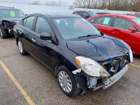 2012 Nissan Versa for sale at WELLER BUDGET LOT in Grand Rapids MI
