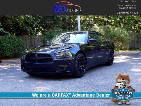 2013 Dodge Charger for sale at Zed Motors in Raleigh NC