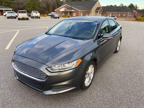 2016 Ford Fusion for sale at Carprime Outlet LLC in Angier NC