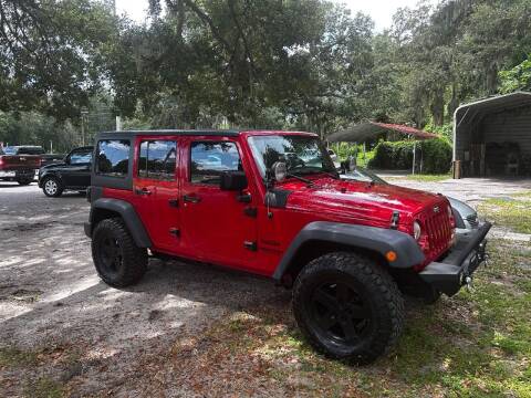 2014 Jeep Wrangler Unlimited for sale at TEAM AUTOMOTIVE in Valrico FL