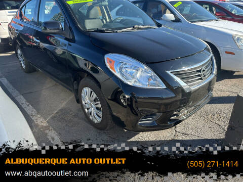 2014 Nissan Versa for sale at ALBUQUERQUE AUTO OUTLET in Albuquerque NM
