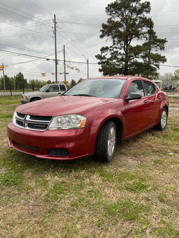 2014 Dodge Avenger for sale at COUNTRY MOTORS in Houston TX