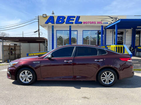 2019 Kia Optima for sale at Abel Motors, Inc. in Conroe TX