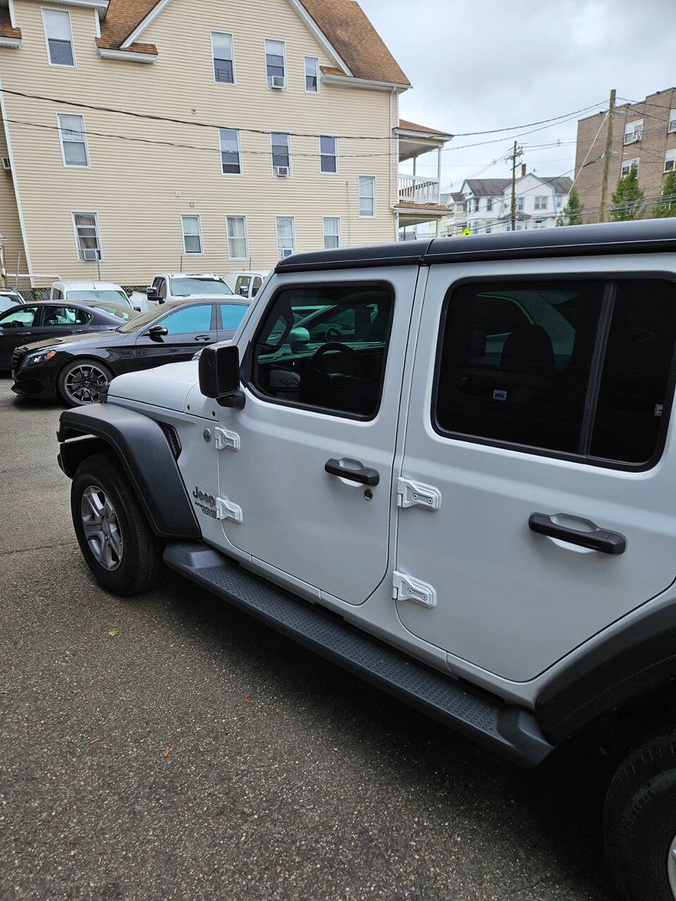 2019 Jeep Wrangler Unlimited for sale at RENOS AUTO SALES LLC in Waterbury, CT