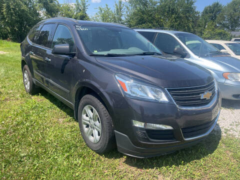 2016 Chevrolet Traverse for sale at HEDGES USED CARS in Carleton MI