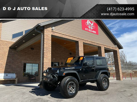 2014 Jeep Wrangler for sale at D & J AUTO SALES in Joplin MO