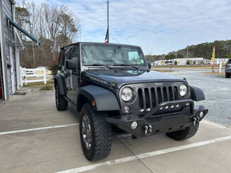 2014 Jeep Wrangler Unlimited for sale at Allstar Automart in Benson NC