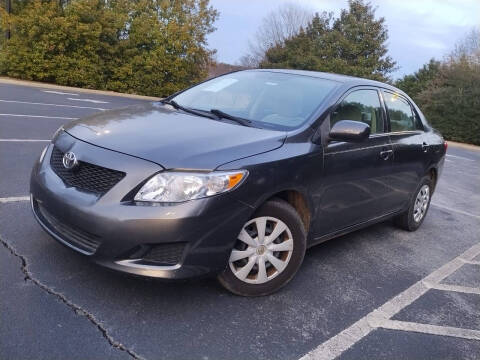 2009 Toyota Corolla for sale at Cheko SW Auto Sales LLC in Suwanee GA