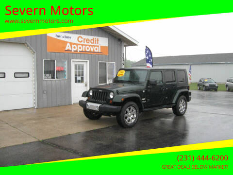 2010 Jeep Wrangler Unlimited for sale at Severn Motors in Cadillac MI