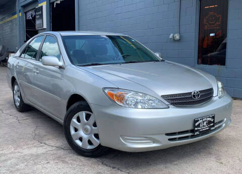 2002 Toyota Camry for sale at Universal Auto Center in Houston TX
