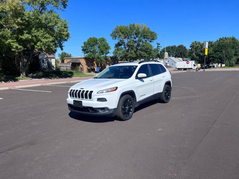 2014 Jeep Cherokee for sale at New Stop Automotive Sales in Sioux Falls SD