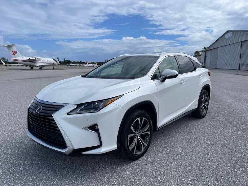 Used 2018 Lexus RX 450h with VIN 2T2BGMCA4JC029438 for sale in Pompano Beach, FL