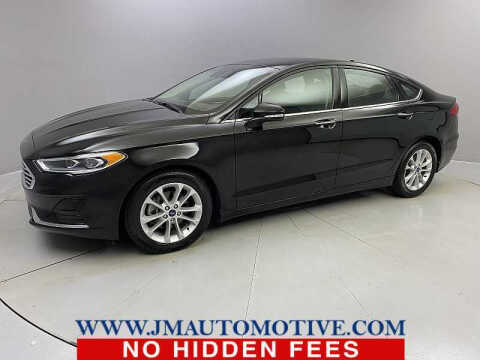 2020 Ford Fusion Hybrid for sale at J & M Automotive in Naugatuck CT