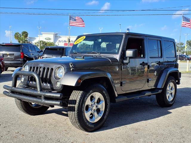 2014 Jeep Wrangler Unlimited for sale at Winter Park Auto Mall in Orlando, FL