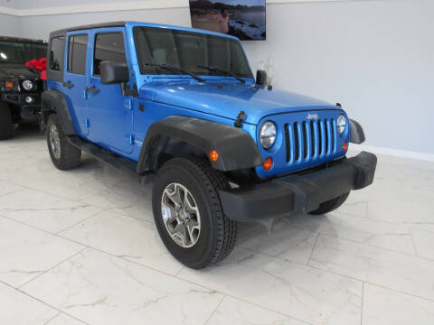 2010 Jeep Wrangler Unlimited for sale at Dealer One Auto Credit in Oklahoma City OK