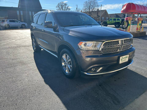 2015 Dodge Durango for sale at Carney Auto Sales in Austin MN