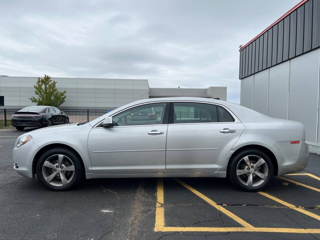 2012 Chevrolet Malibu for sale at Carventure in Lansing, MI