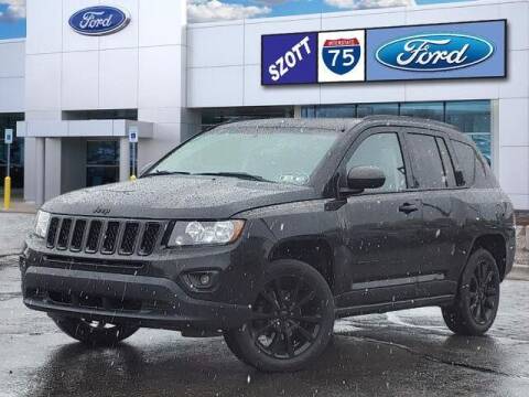 2014 Jeep Compass for sale at Szott Ford in Holly MI