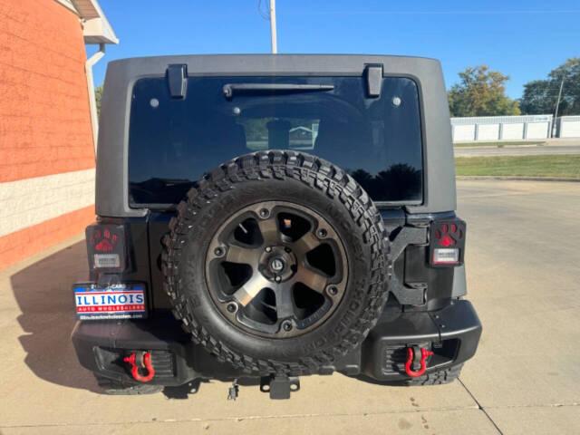 2014 Jeep Wrangler Unlimited for sale at Illinois Auto Wholesalers in Tolono, IL