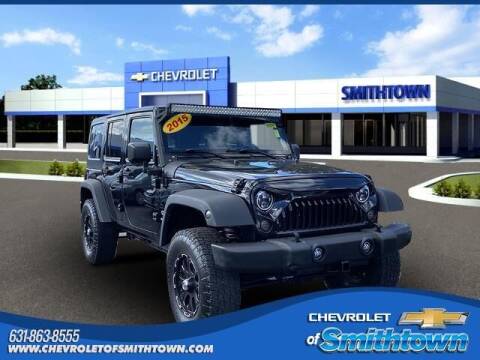 2015 Jeep Wrangler Unlimited for sale at CHEVROLET OF SMITHTOWN in Saint James NY