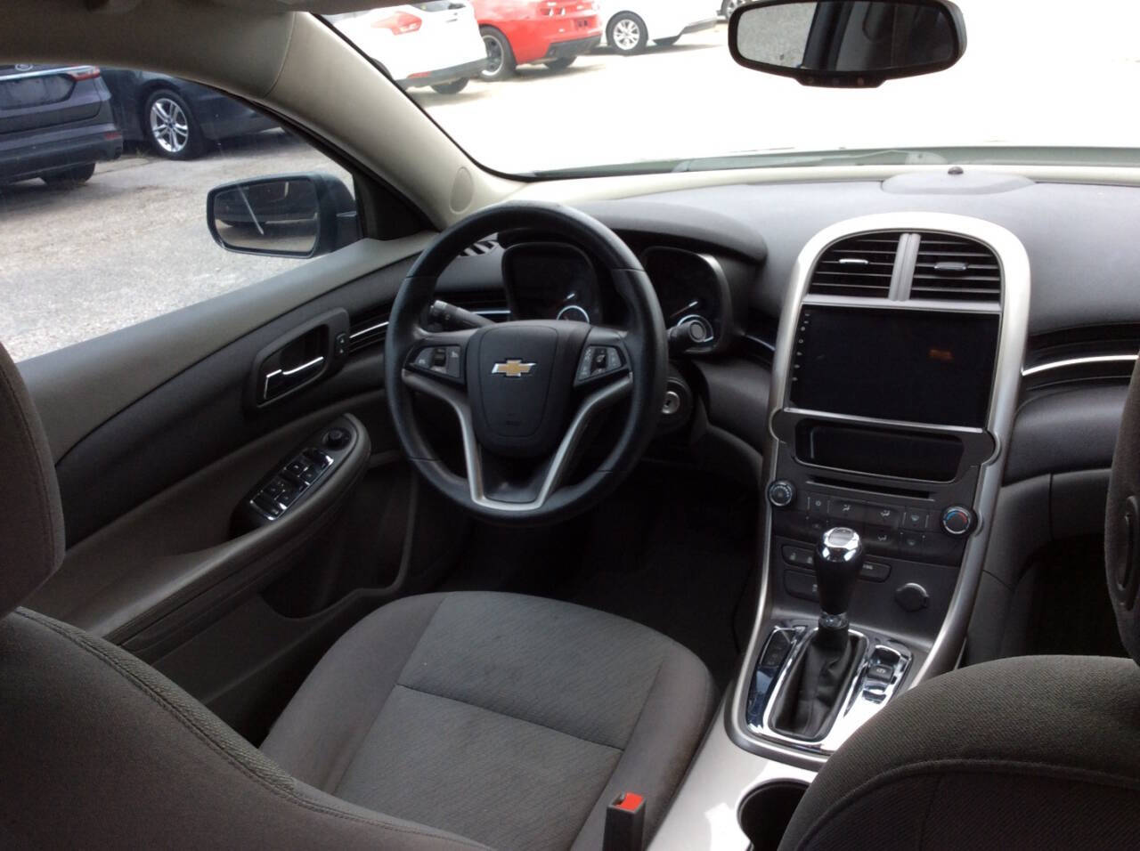 2013 Chevrolet Malibu for sale at SPRINGTIME MOTORS in Huntsville, TX