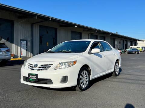 2013 Toyota Corolla for sale at DASH AUTO SALES LLC in Salem OR