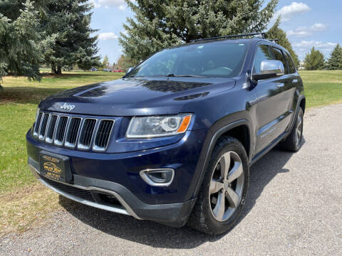 2014 Jeep Grand Cherokee for sale at BELOW BOOK AUTO SALES in Idaho Falls ID
