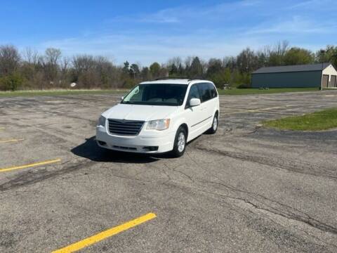 2010 Chrysler Town and Country for sale at Caruzin Motors in Flint MI