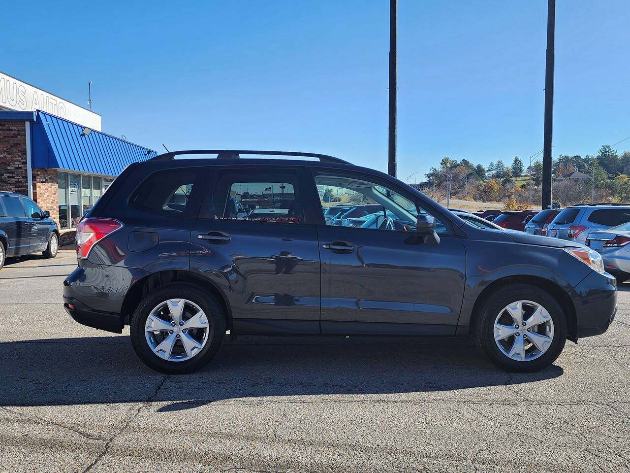 2015 Subaru Forester for sale at Optimus Auto in Omaha, NE