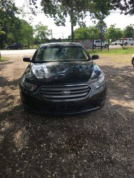 2015 Ford Taurus for sale at COUNTRY MOTORS in Houston TX