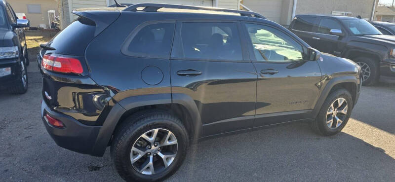 Used 2015 Jeep Cherokee Trailhawk with VIN 1C4PJMBS9FW786565 for sale in Sioux City, IA