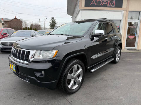 2013 Jeep Grand Cherokee for sale at ADAM AUTO AGENCY in Rensselaer NY