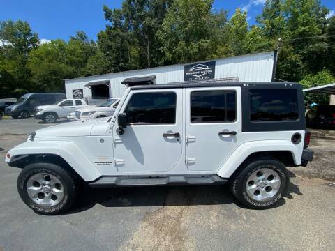 2014 Jeep Wrangler Unlimited for sale at Monroe Auto's, LLC in Parsons TN