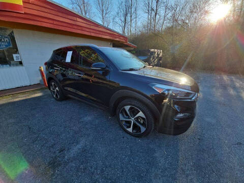 2016 Hyundai Tucson for sale at Friendly Auto Gallery in Cumming GA