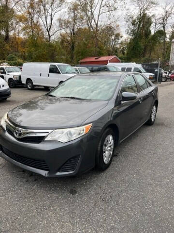 2014 Toyota Camry for sale at Amazing Auto Center in Capitol Heights MD