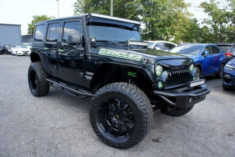 2012 Jeep Wrangler Unlimited for sale at CU Carfinders in Norcross GA