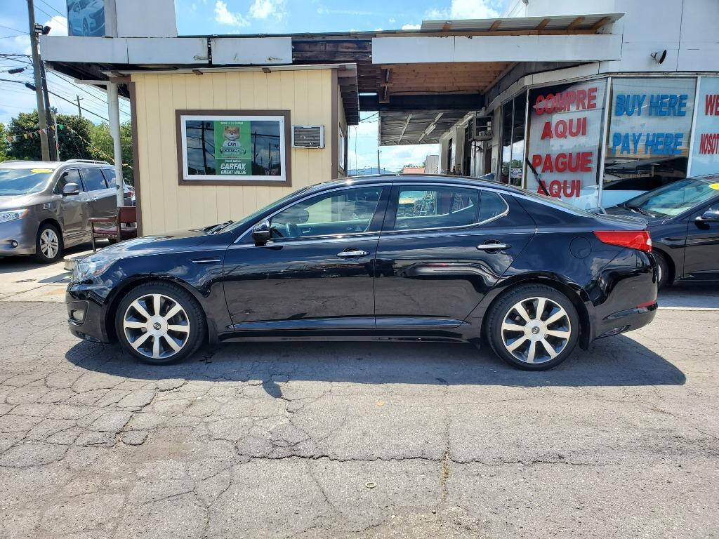 2012 Kia Optima for sale at DAGO'S AUTO SALES LLC in Dalton, GA