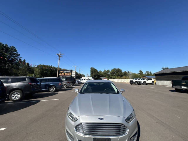 2016 Ford Fusion Hybrid for sale at Auto Hunter in Webster, WI