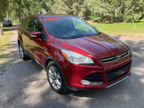 2013 Ford Escape for sale at BELOW BOOK AUTO SALES in Idaho Falls ID