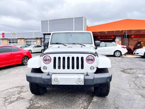 2014 Jeep Wrangler Unlimited for sale at North Chicago Car Sales Inc in Waukegan IL