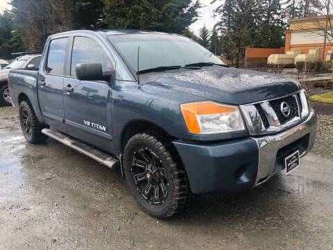 2013 Nissan Titan for sale at M & M Auto Sales in Olympia WA
