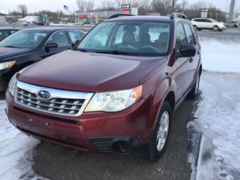 2012 Subaru Forester for sale at Sparkle Auto Sales in Maplewood MN