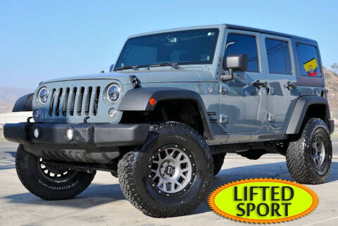 2014 Jeep Wrangler Unlimited for sale at Kustom Carz in Pacoima CA