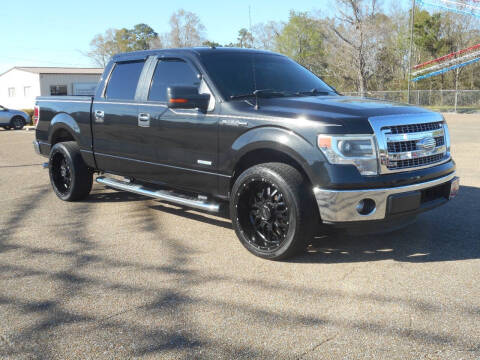 2014 Ford F-150 for sale at STRAHAN AUTO SALES INC in Hattiesburg MS
