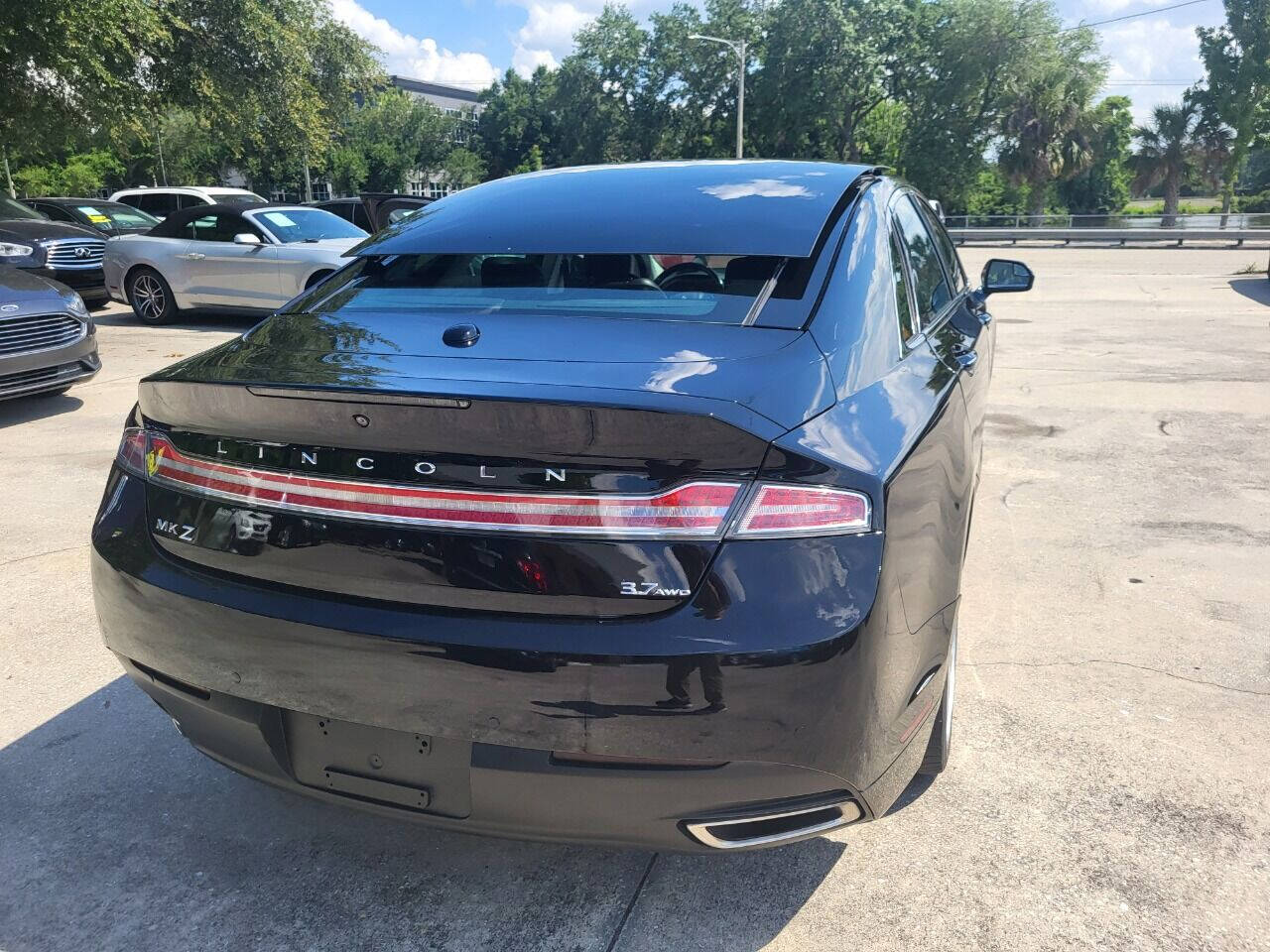 2016 Lincoln MKZ for sale at FAMILY AUTO BROKERS in Longwood, FL