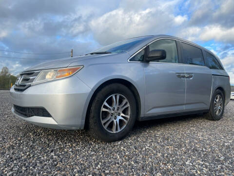 2011 Honda Odyssey for sale at Jim's Hometown Auto Sales LLC in Cambridge OH
