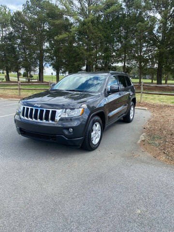2011 Jeep Grand Cherokee for sale at Super Sports & Imports Concord in Concord NC